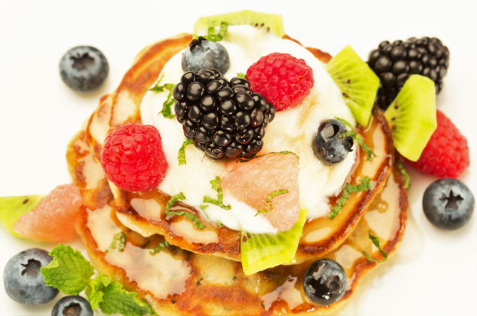 Wild Rice Griddle Cake- yogurt, mixed berries and fruits, with a honey drizzle. 