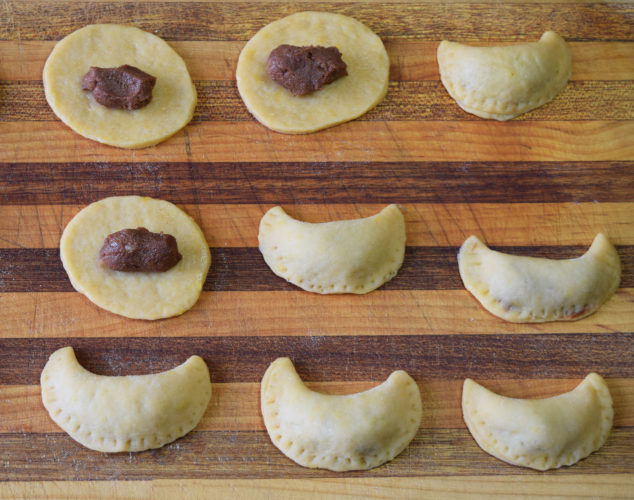 Filling and shaping the cookies.