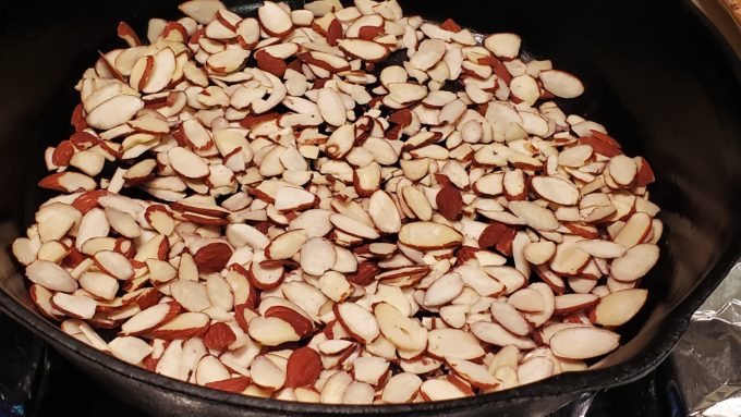 Lightly dry toast the almonds in a saute pan.